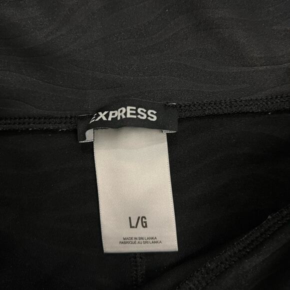 EXPRESS Zebra Patter Coated Leggings Women’s size Large - Picture 7 of 11